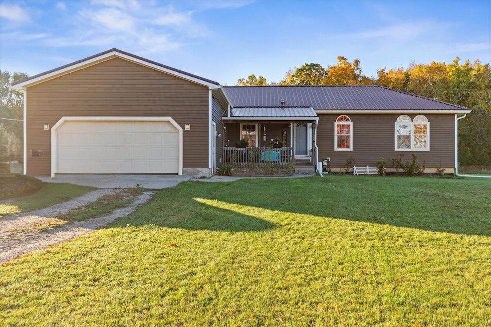 1114 E Station Rd, Sheridan, MI 48884 - photo 1