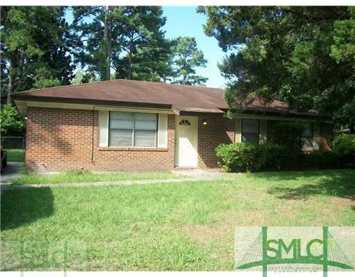 Exterior Front. All Brick Exterior.  Privacy Fence