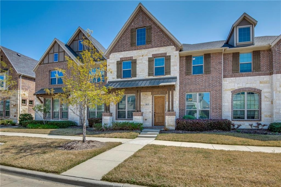 Beautiful drive up on this like-new townhome.