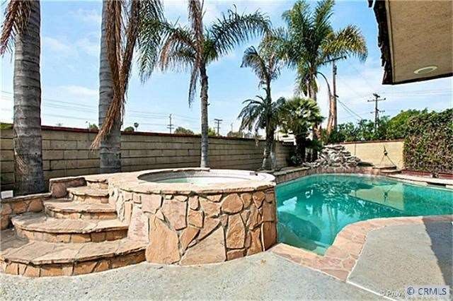 pool home on a pie shape lot in the heart of Cypre
