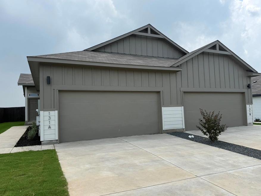 View of front of house with board and batten sidi