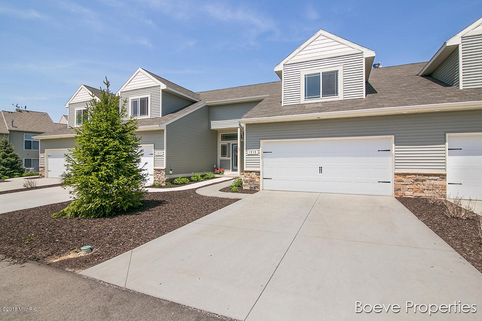 1215 Kingman Ct SW unit 57, Byron Center, MI 49315 - photo 1