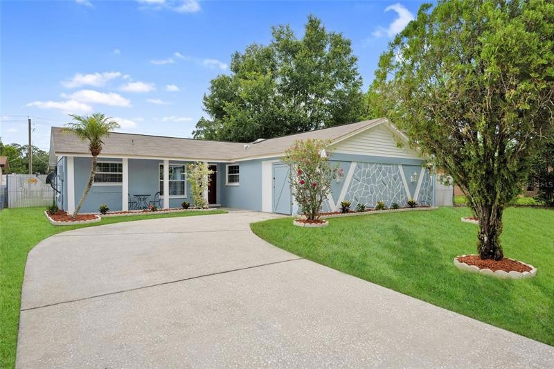 Newly Painted Exterior with Side Entry Garage/Storage. **DISCLAIMER: We have new sod installed, but the grass does not look this green**
