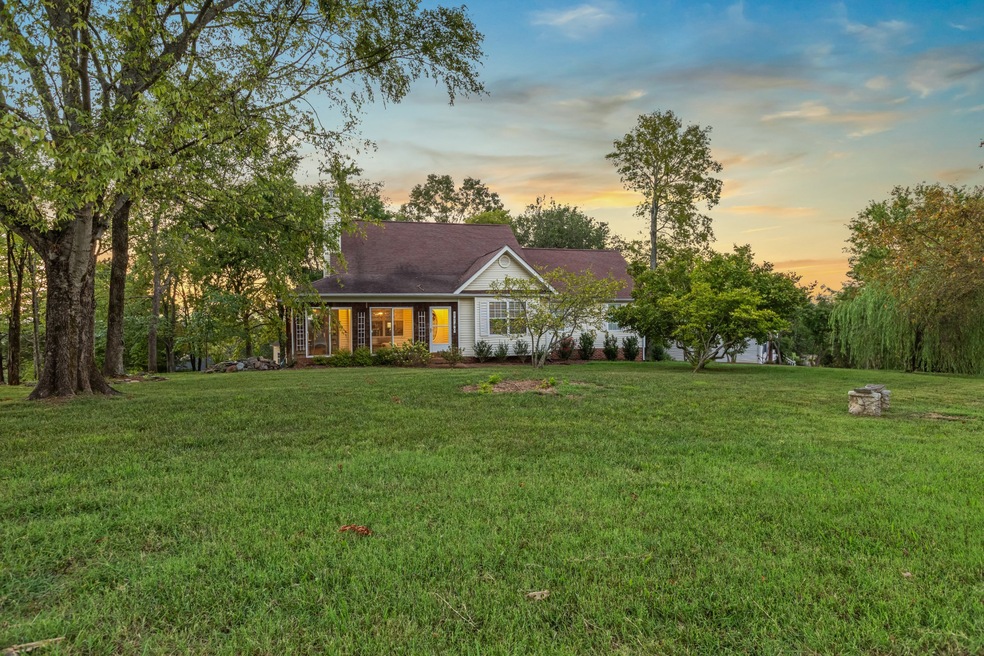 Welcome to 1740 Creekstone Dr in Columbia! This stunning home, set on a spacious lot has designer finishes throughout. The enclosed patio, complete with a water garden, offers the ideal setting to enjoy the beautiful weather with a cup of coffee.