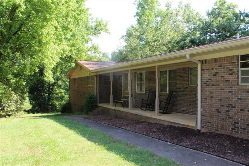 Well built home close to Lake Lanier with 3.16 acr