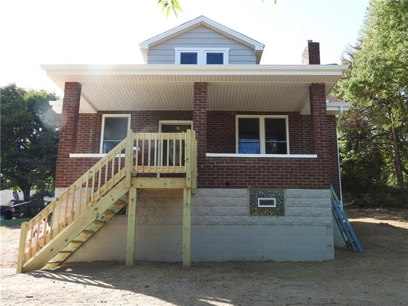 Front of home with brand new face lift