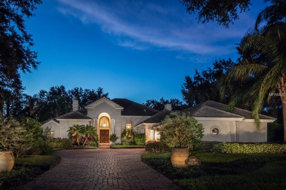 Situated along the mature oaks of Latrobe Drive, t