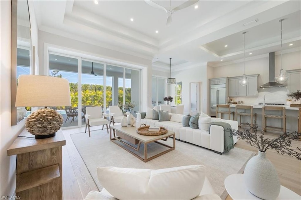 The open concept main living area features white o