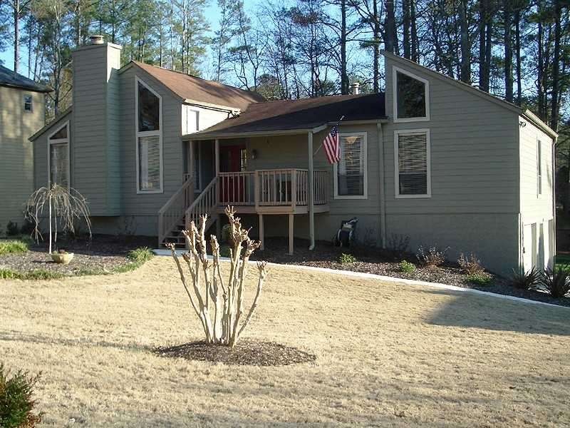 Exterior Front. New siding, driveway and sidewalk,