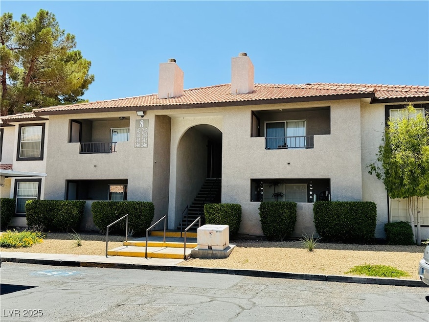 View of property featuring stairs