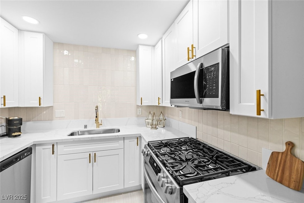 Kitchen featuring appliances with stainless steel