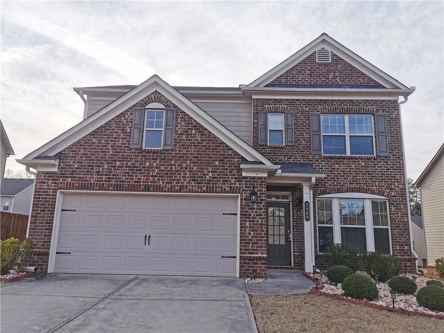 Front of property with a garage