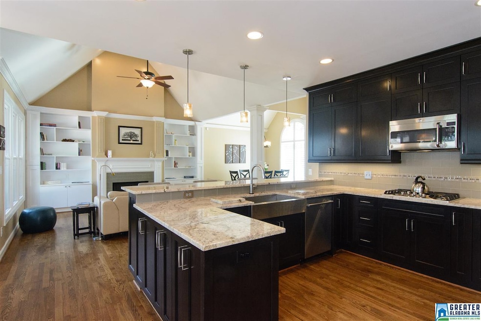 Open plan. Stunning custom kitchen. Be sure to ope