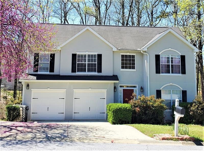 Beautiful blooms and well-maintained front of hous