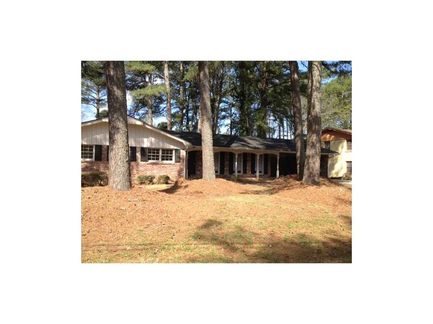Exterior Front. Lovely 4 sided brick home on large