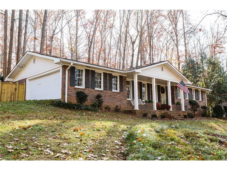 Gorgeous 4-sided brick ranch, in the heart of Fore