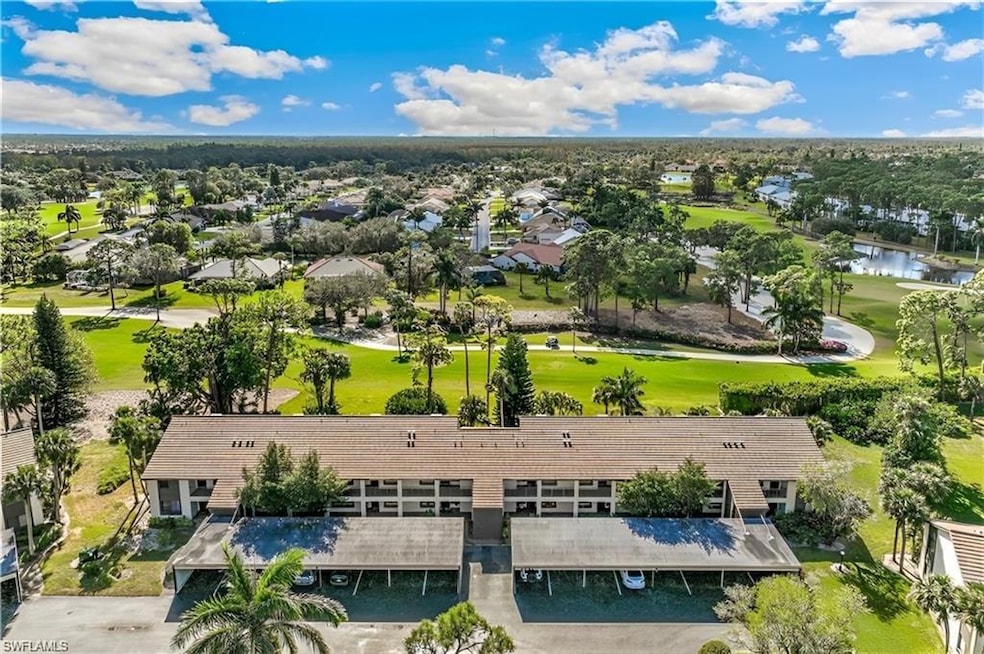 5841 Rattlesnake Hammock Rd unit 203, Naples, FL 34113 - photo 1