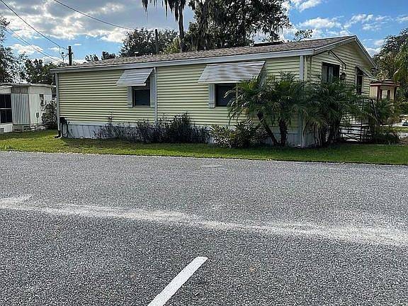 402 Sunset Ln, Lady Lake, FL 32159 - photo 1