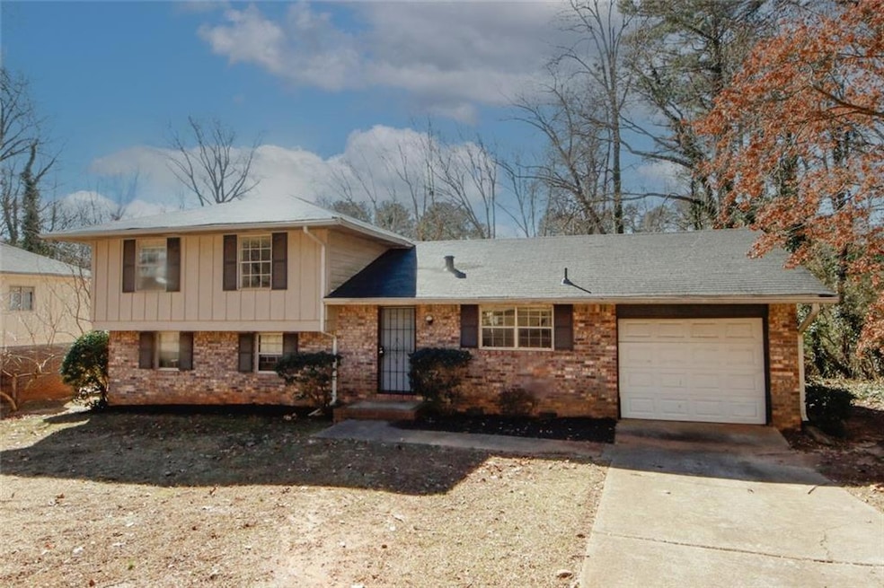 Tri-level home featuring a garage