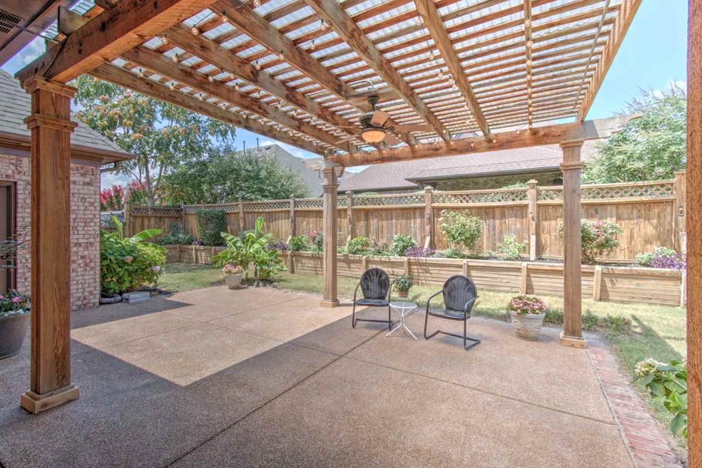 Solar Lit Sconces on Designer Fence for Extra light with Lit Pergola