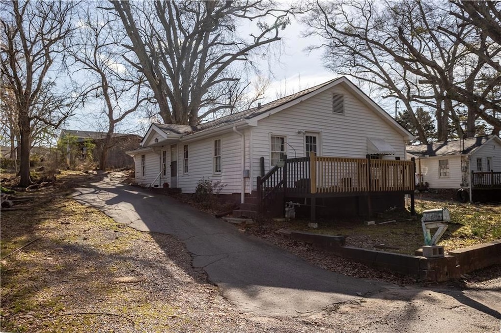 View of property exterior with a deck