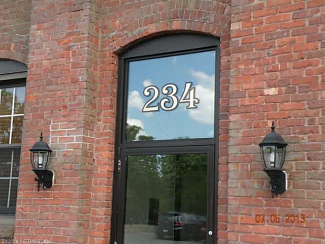 Exterior Front. Secured entry doorway.  Keyed entr