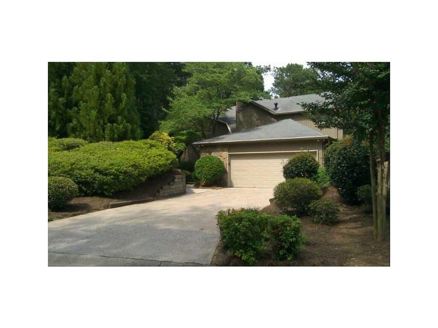 Exterior Front. Front from curb, lush landscaping.
