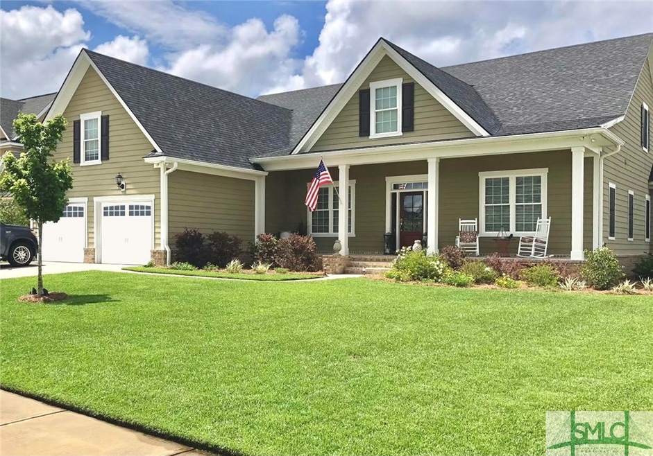 This pretty hardiplank (concrete siding) home is o