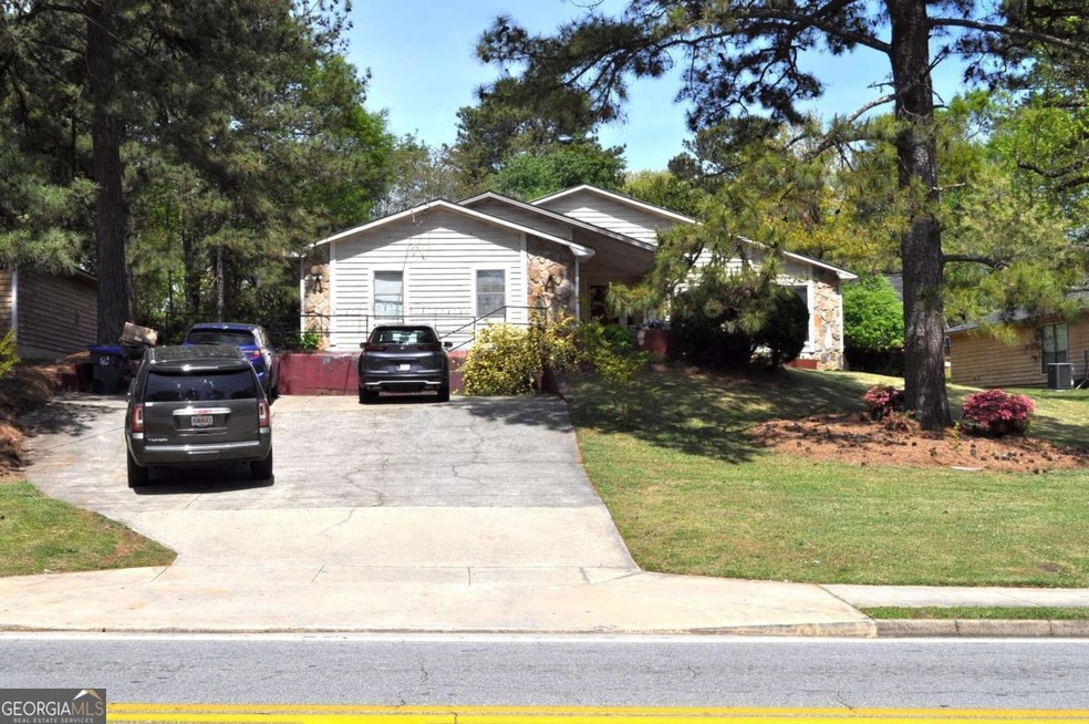 1090 Dickens Rd NW, Lilburn, GA 30047 - photo 1