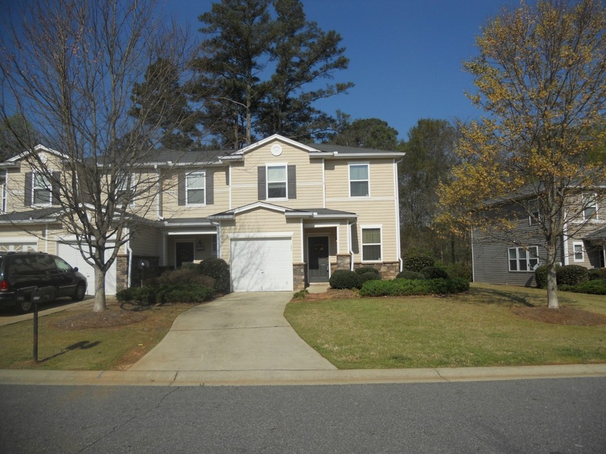 End Unit With Wooded Backyard