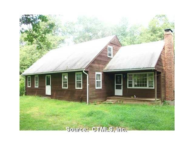 Exterior Front. Front elevation with open front po