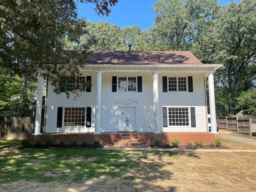 View of front of house with a front yard