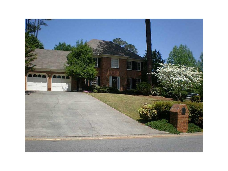 Exterior Front. WOW! 4 Sided brick beauty! Roswell