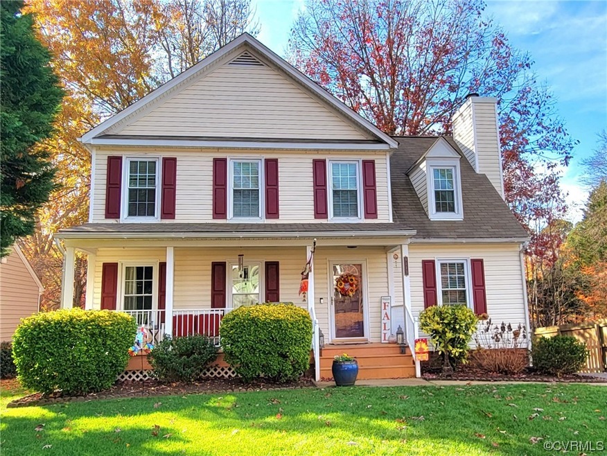 Vinyl siding, Trex decking on the front porch, and