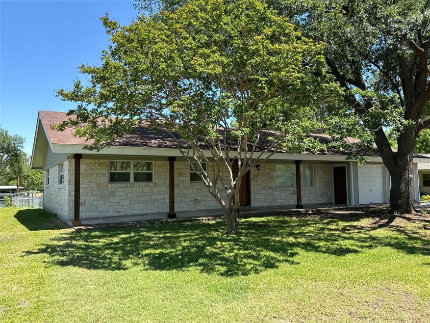 View of front of property with an attached garage