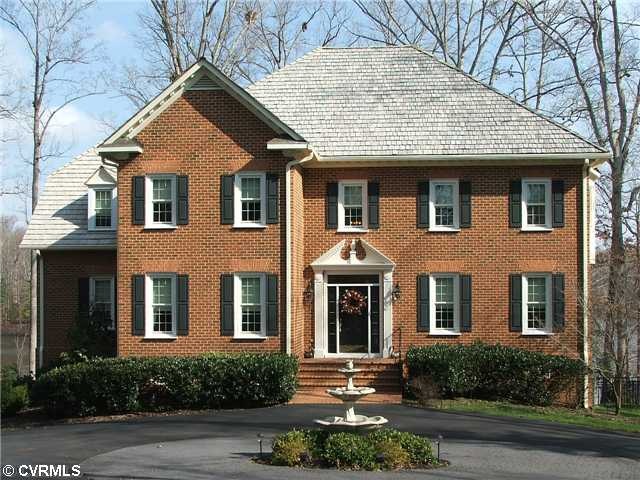 Exterior Front - Long driveway leads to home and l