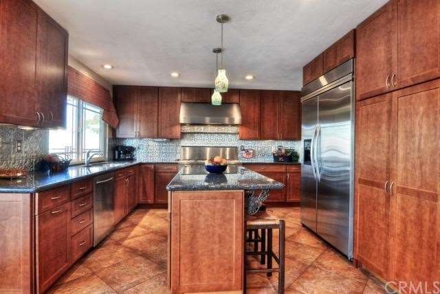 Granite Center Island with Seating & Pendant Light