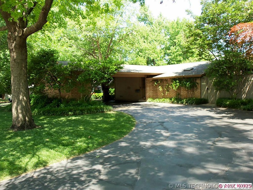 Corner lot with mature professional landscaping