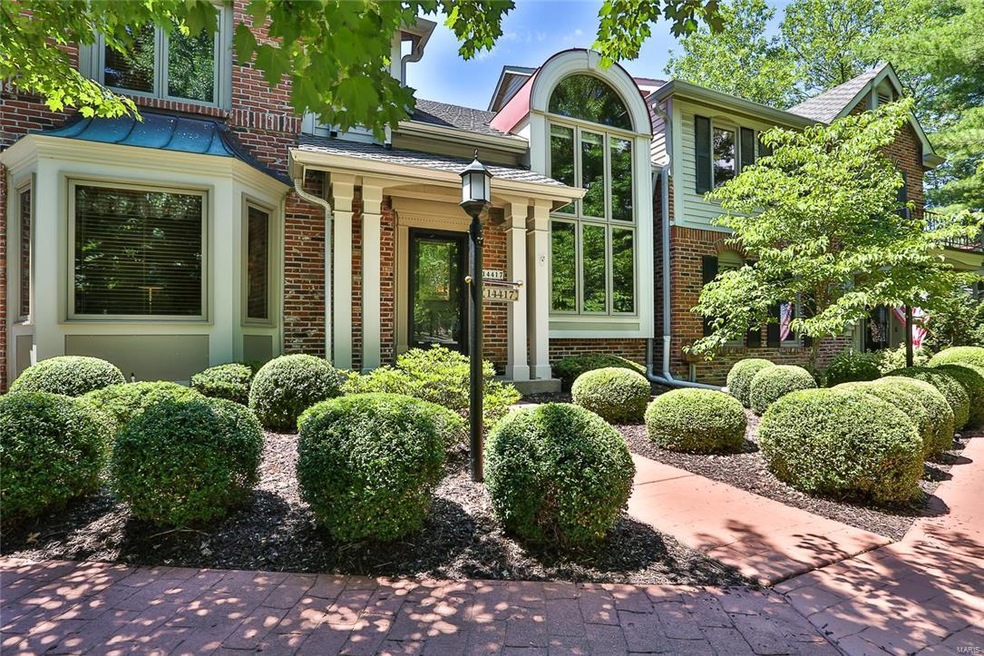Brick front exterior, lamp post lighting, front Po