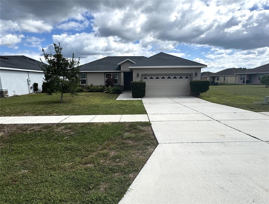 33918 Emerald Pond Loop, Leesburg, FL 34788 - photo 1