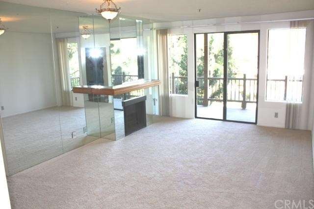 Bright living room with mirror wall
