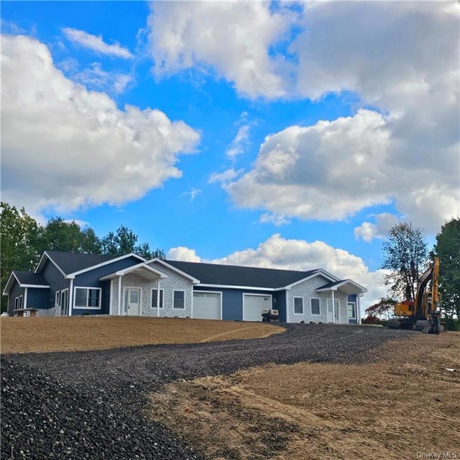 Ranch-style home with a garage