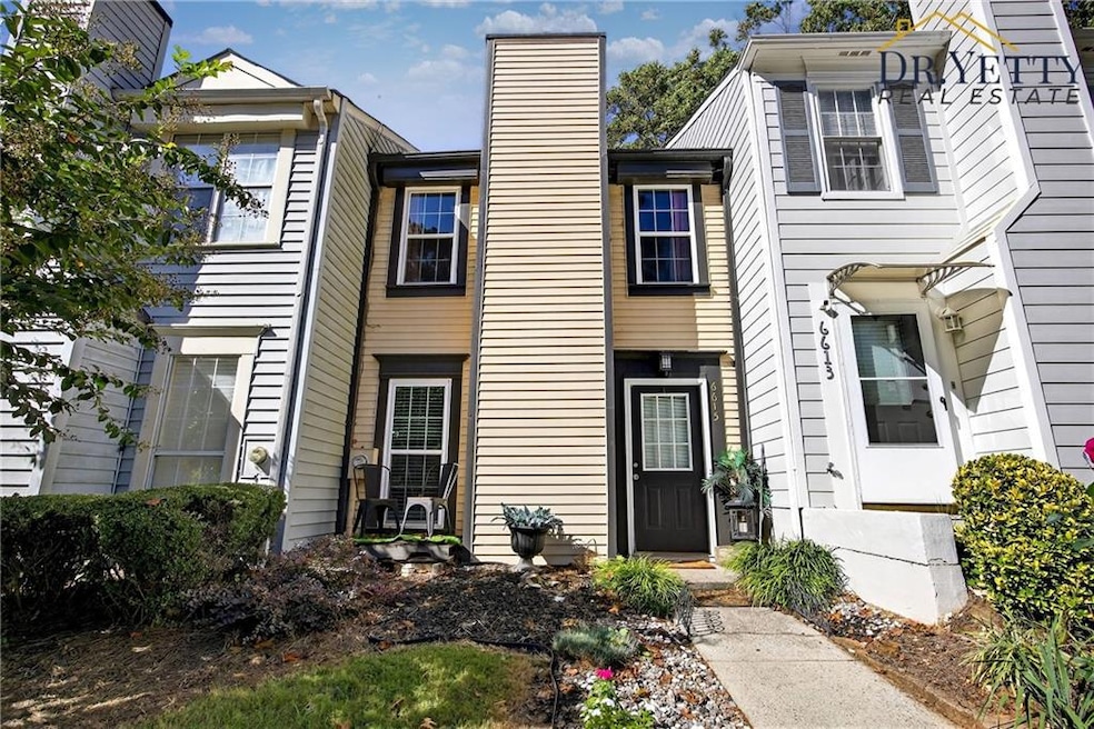 View of front of property with a chimney