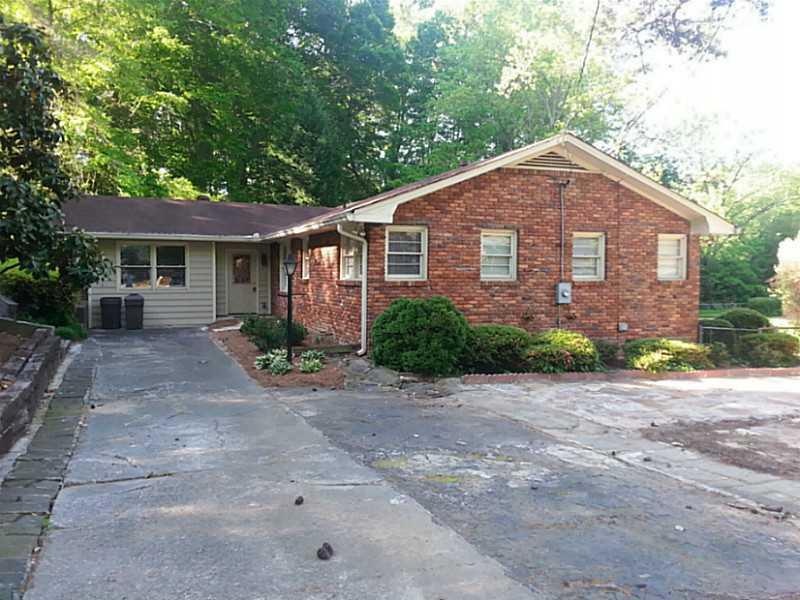 Exterior Front. Garage was closed off and space ad
