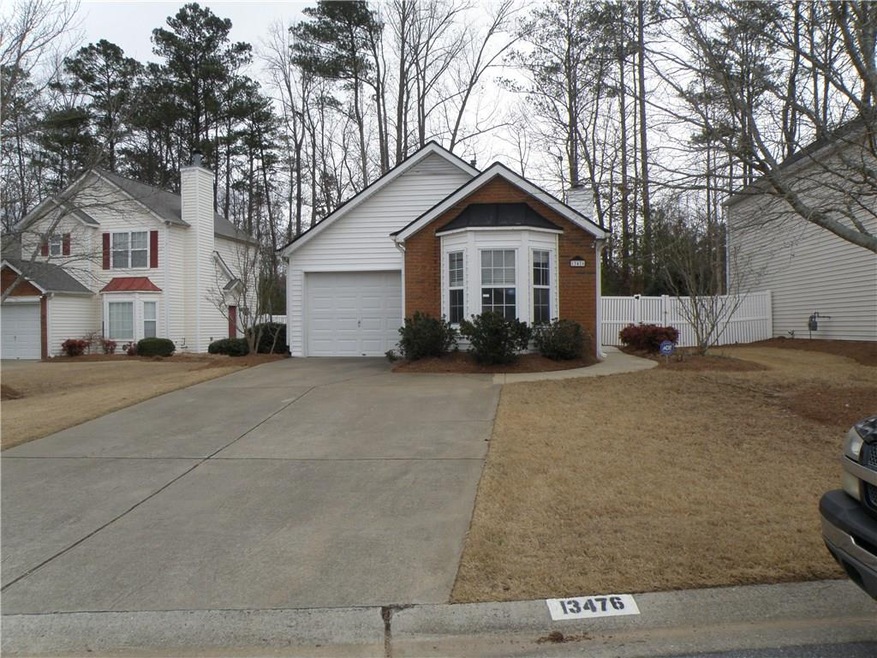 Brick Front with Easy Care vinyl siding. Note the 