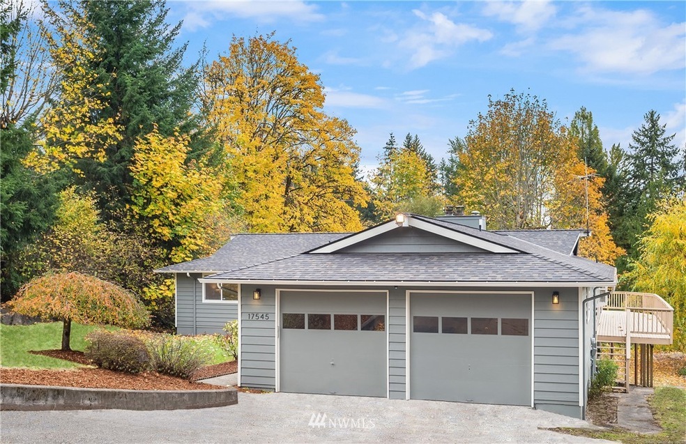 A wonderful setting on over 1/2 acre. The roof & gutters were installed in 2020.