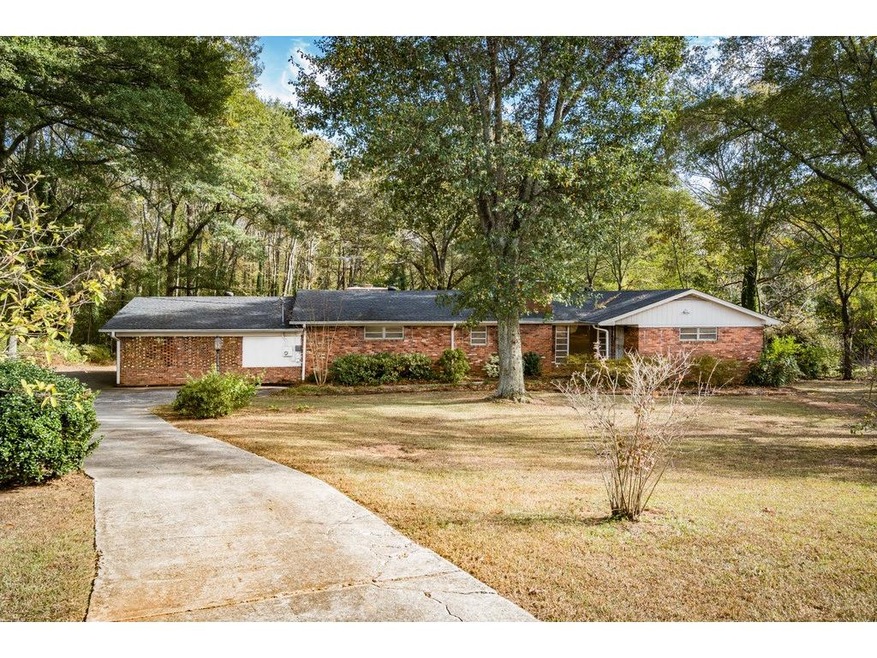 GREAT THREE BEDROOM BRICK ON 1.7 ACRE LOT