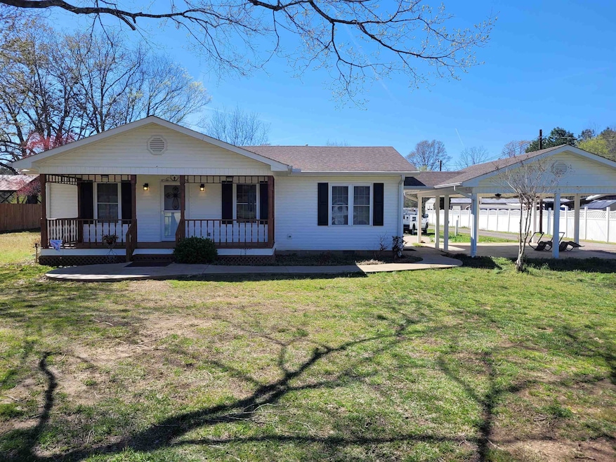 View of front of property with fence, crawl space,