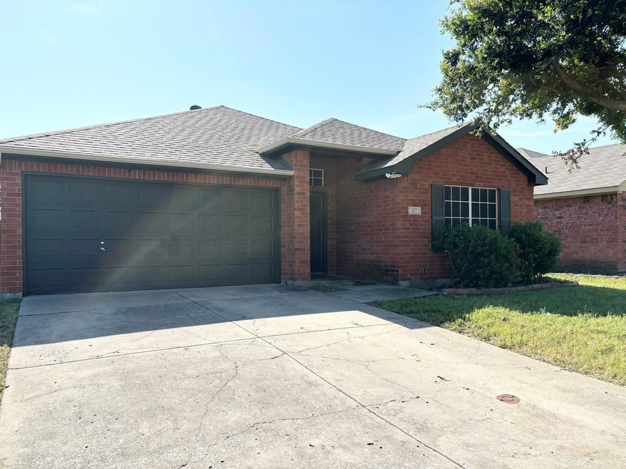Ranch-style house with a garage