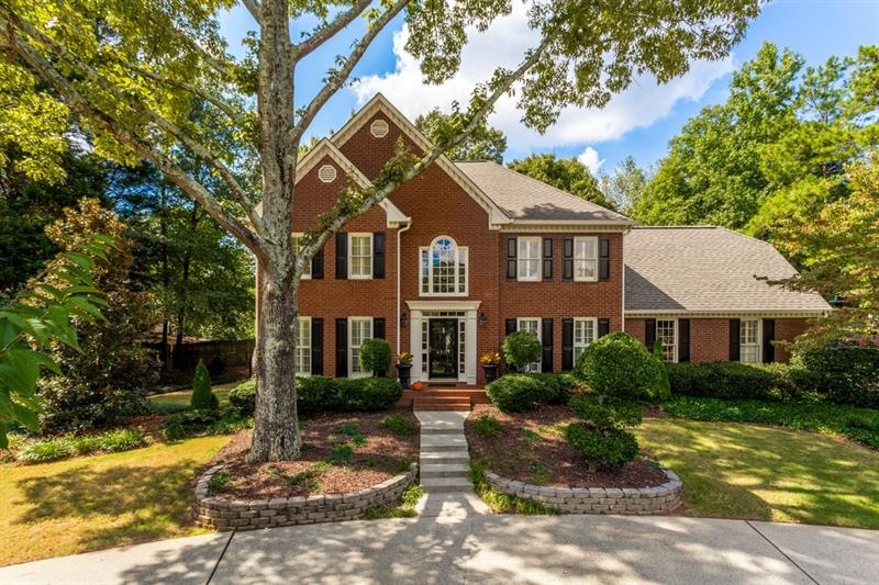 Front view of this stately Brick Home from the Cir